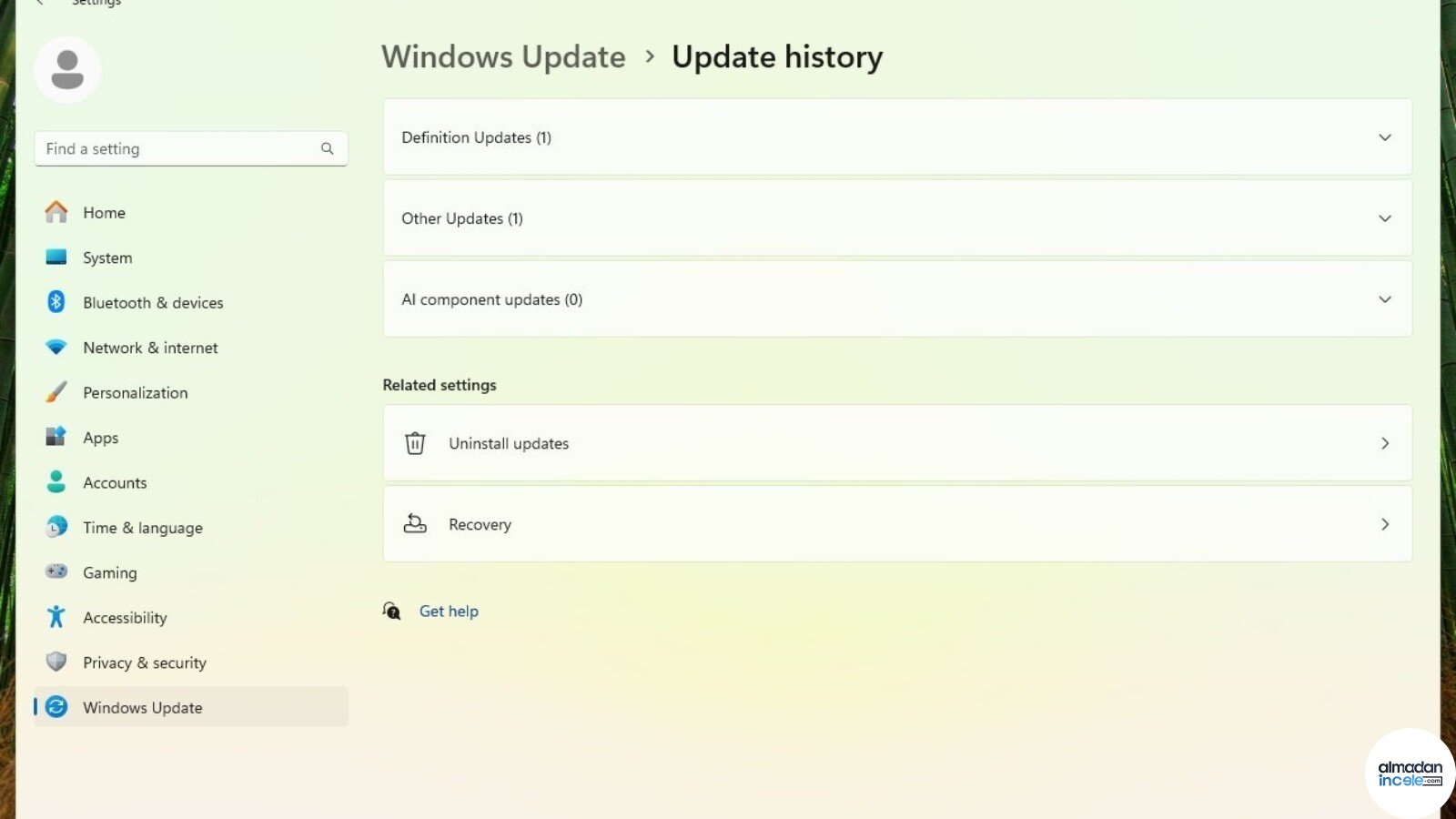 Windows 11 ayarlarında AI component updates satırının görüldüğü güncelleme geçmişi ekranı
