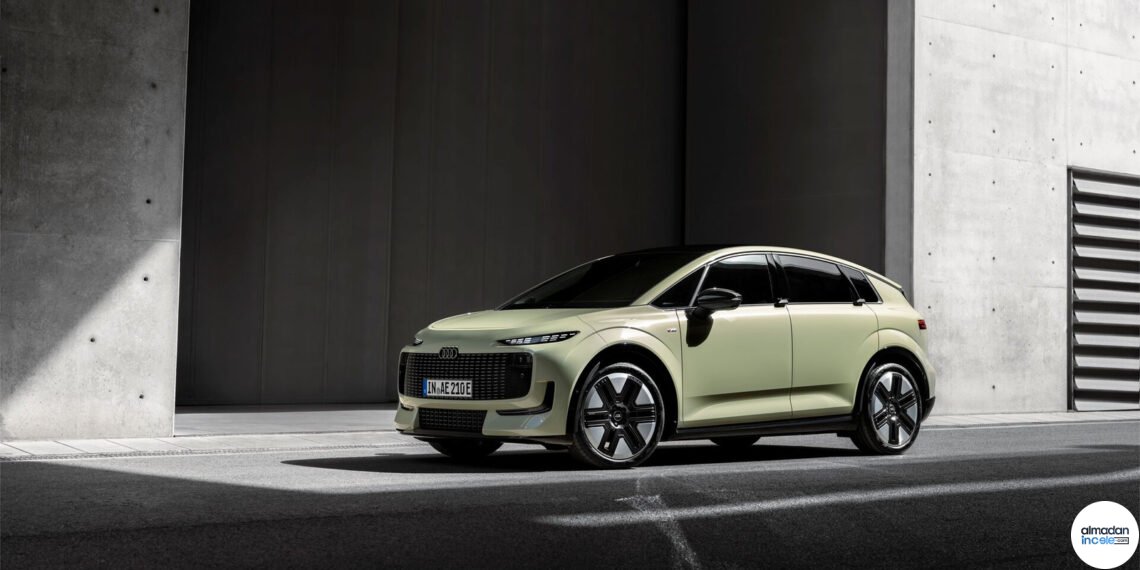 Fıstık yeşili Audi A2 e-tron dış mekânda önden üç çeyrek görünüm