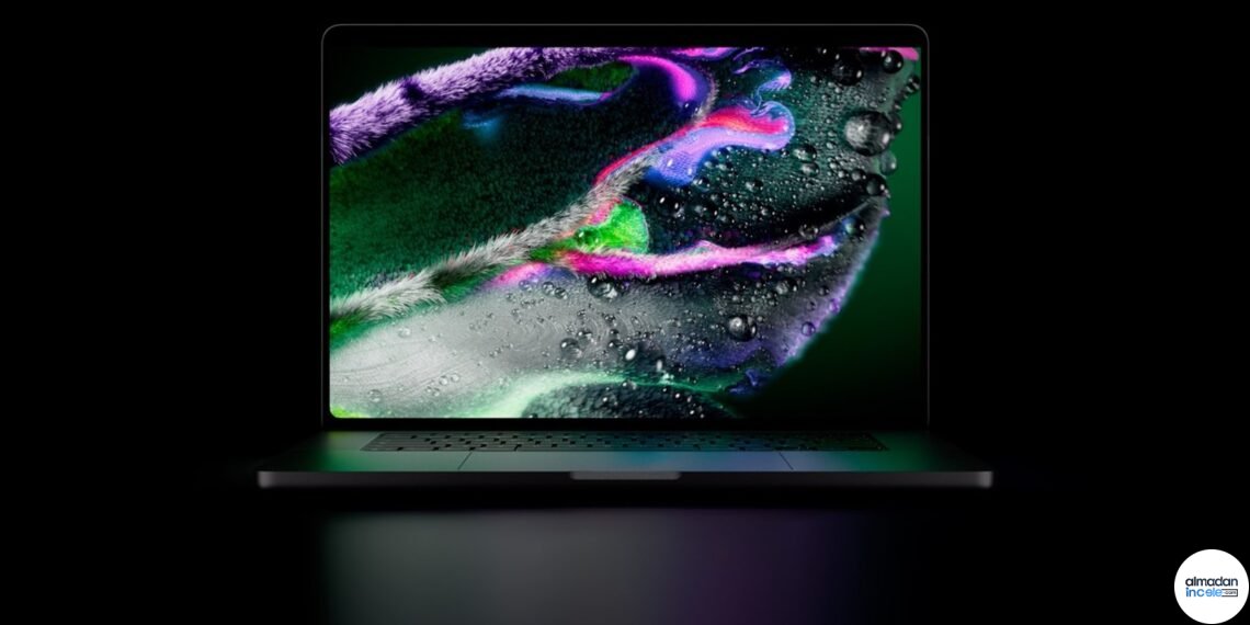 Apple MacBook Pro PROLED XDR ekranında dokunmatik içerik düzenleyen kullanıcı